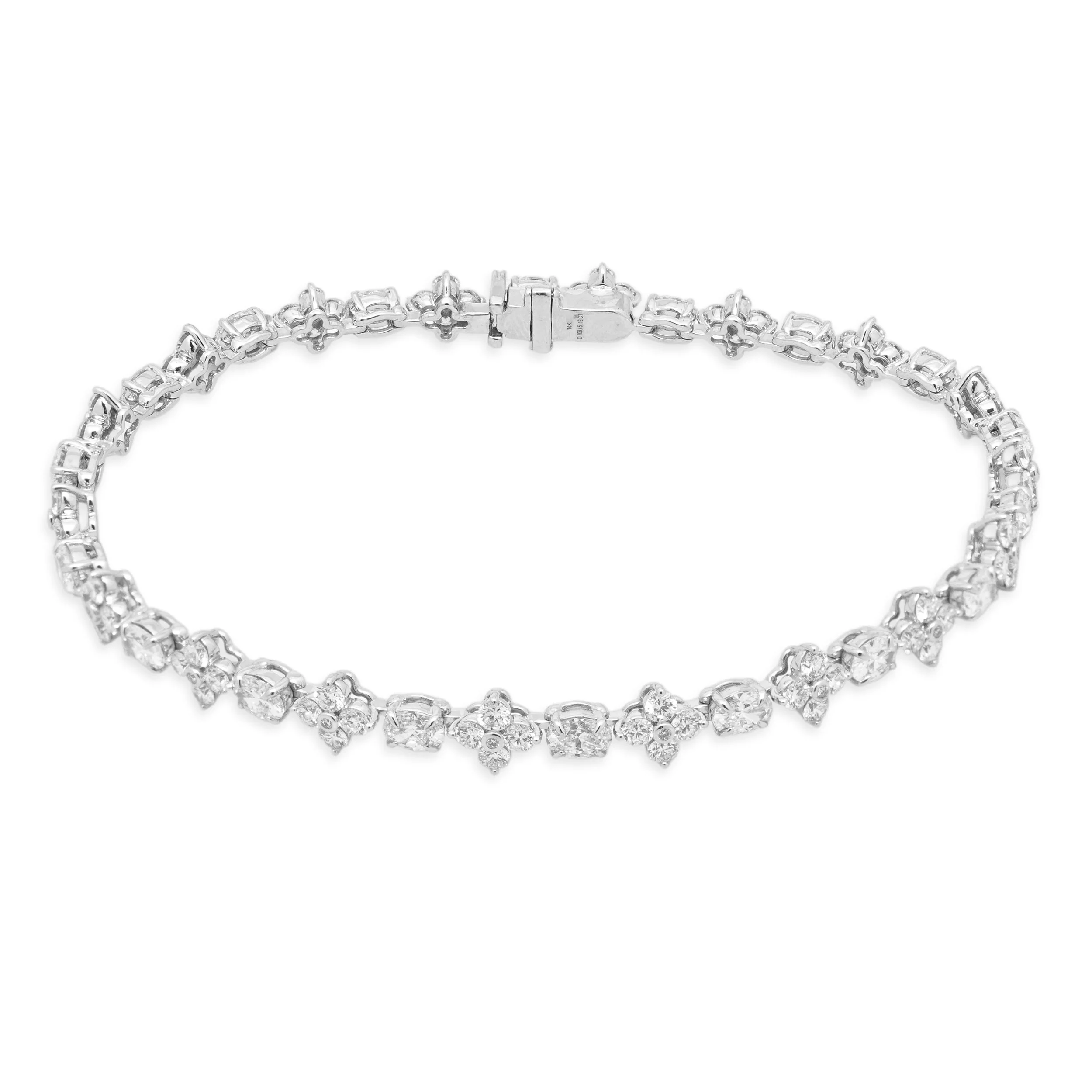 14 Karat White Gold and Alternating Oval and Round Cut Diamond Floral Inline Bracelet
