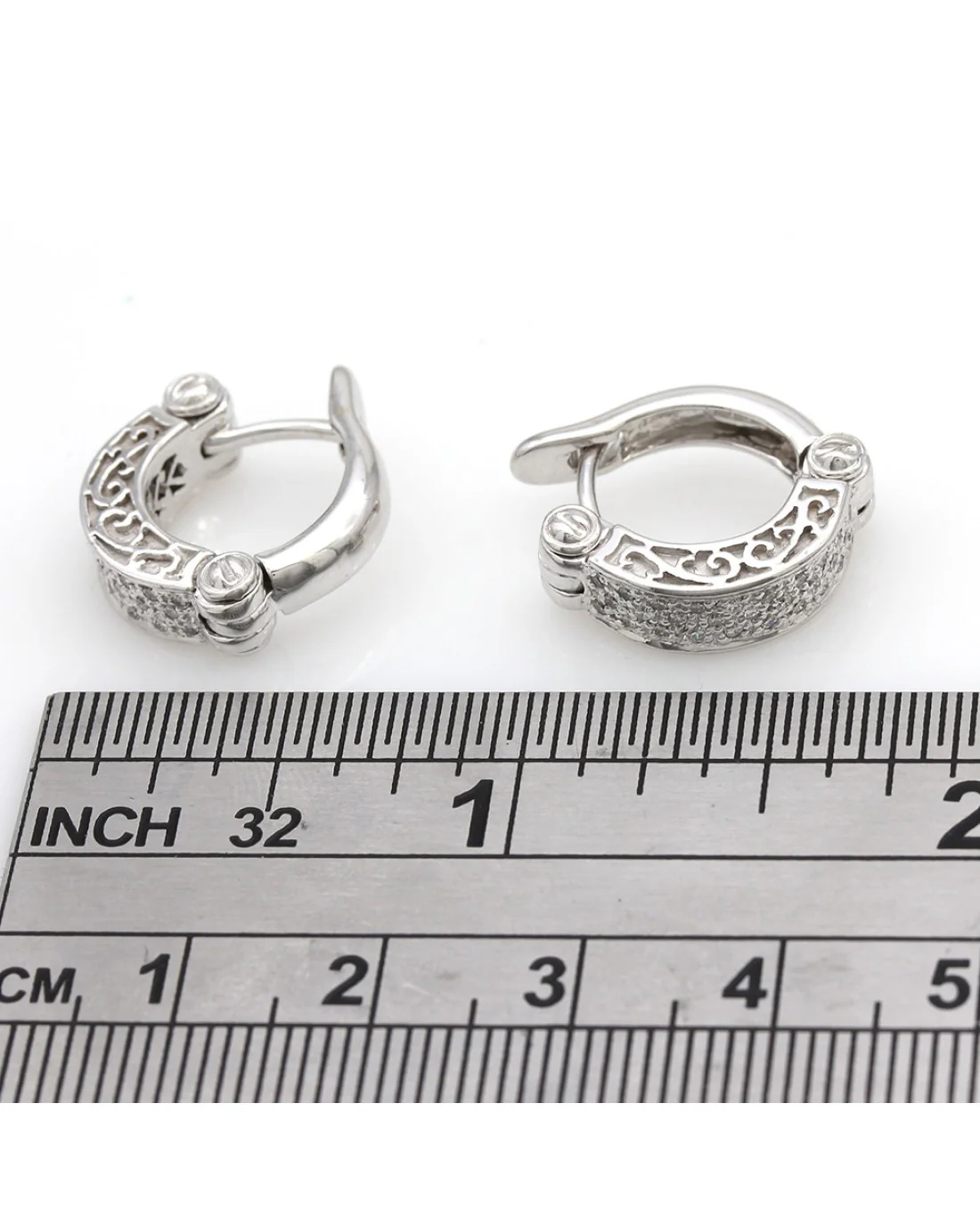 Diamond Pave Huggie Earrings in Gold - Image 3