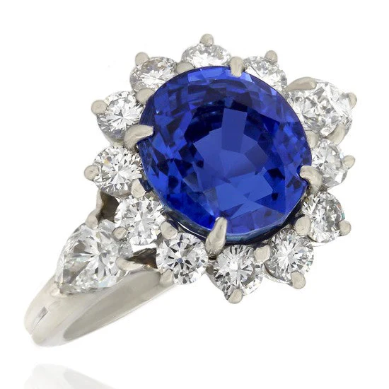 Oval Sapphire and Diamond Halo Ring in Platinum