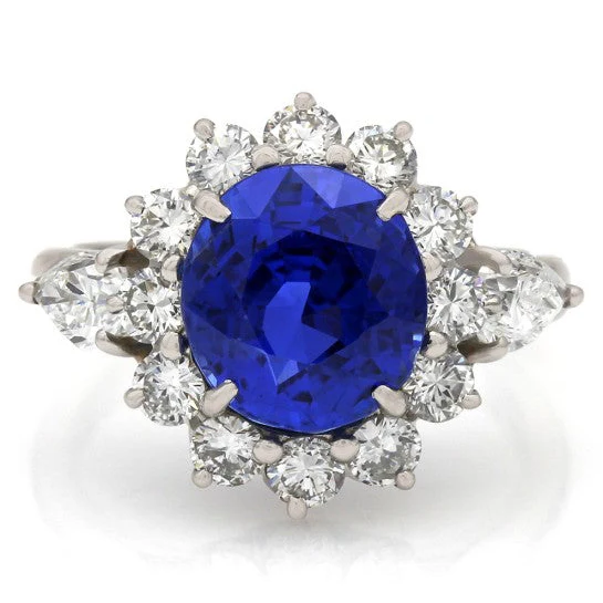 Oval Sapphire and Diamond Halo Ring in Platinum - Image 2