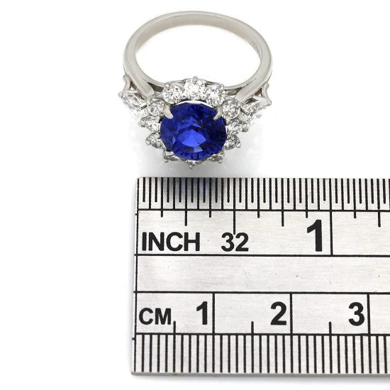 Oval Sapphire and Diamond Halo Ring in Platinum - Image 3
