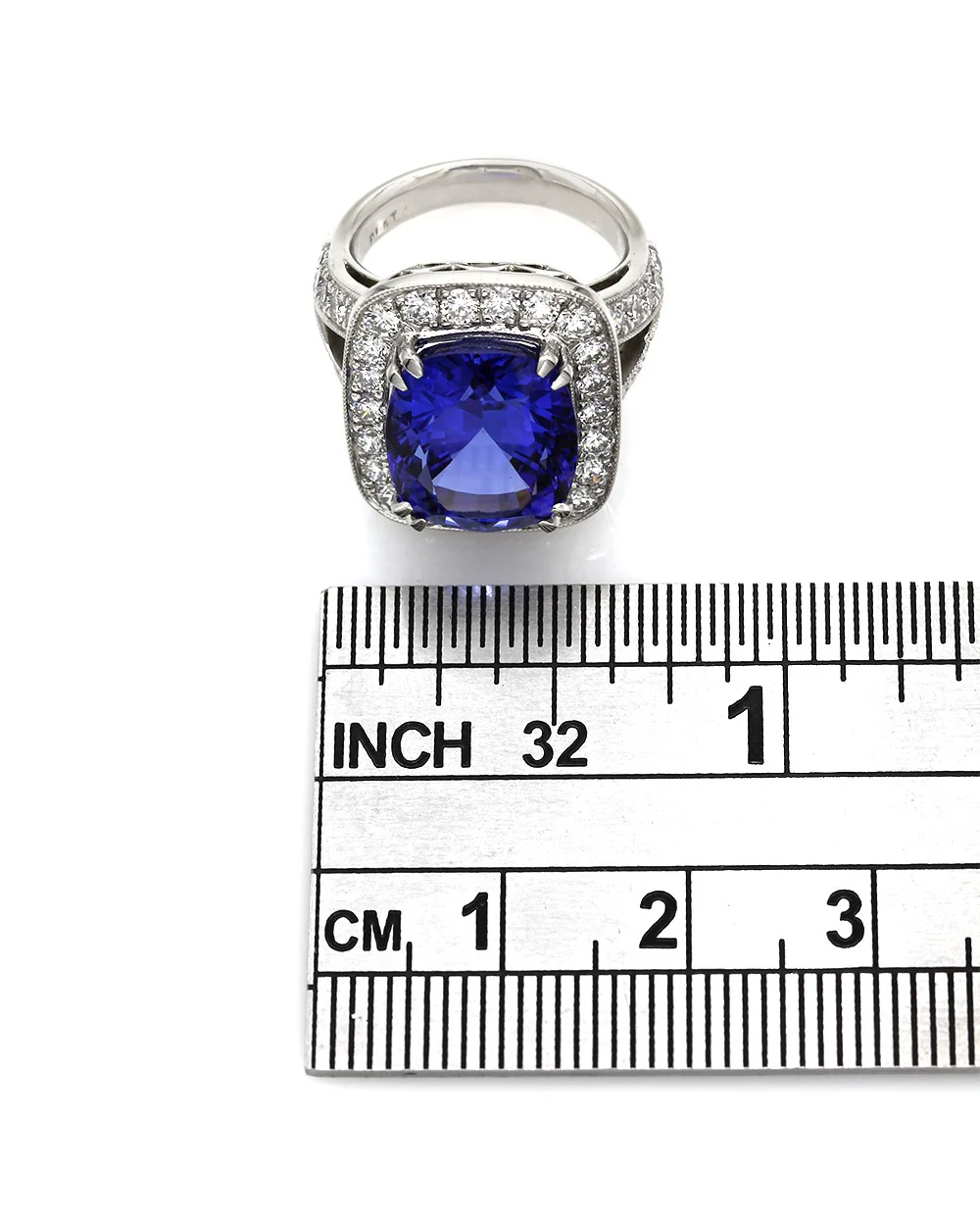 Tanzanite and Diamond Halo Ring in Gold - Image 2